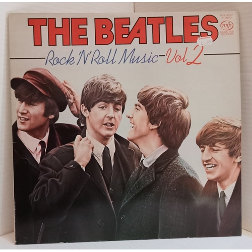 201 - A large collection of 29 Beatles and related 12” records.