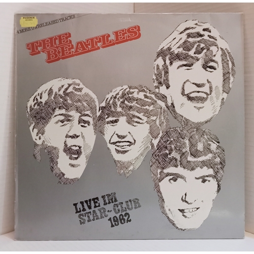 201 - A large collection of 29 Beatles and related 12” records.