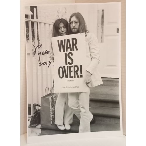 219 - Yoko Ono signed picture of John & Yoko