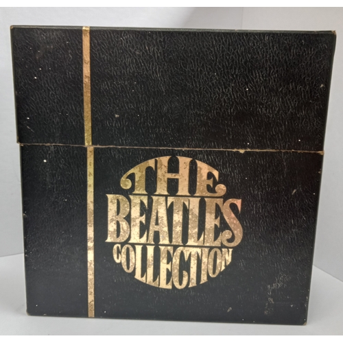 307 - The Beatles Singles Box set black box with gold print includes 25 singles, the Get Back/I’ve Had Eno... 