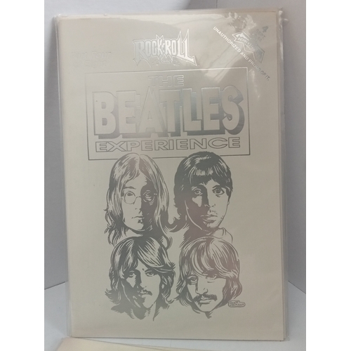 308 - The Beatles Experience RocknRoll comics, Beatles Making of Help! The Movie VHS in Film Canister, plu... 