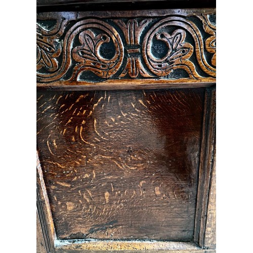 238 - ANTIQUE OAK THREE PANEL CHEST UPON STILE SUPPORTS, DATE 1716 CARVED INTO FRONT PANEL, APPROX 73cm HI... 