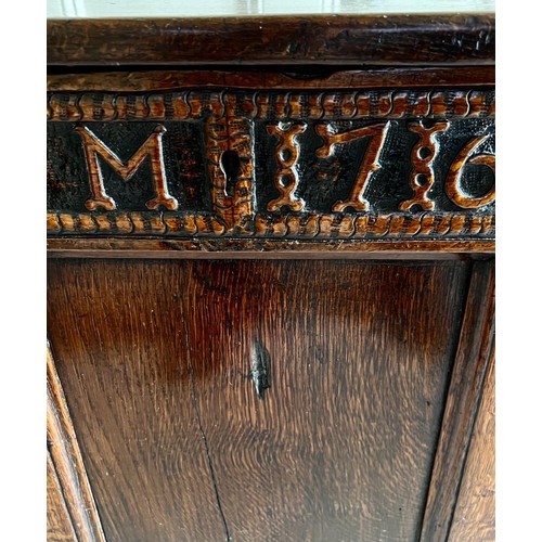 238 - ANTIQUE OAK THREE PANEL CHEST UPON STILE SUPPORTS, DATE 1716 CARVED INTO FRONT PANEL, APPROX 73cm HI... 