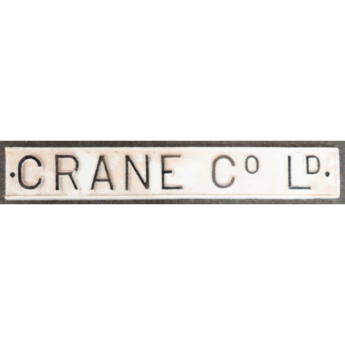 33 - Vintage painted cast iron 'Crane Co Ld' sign