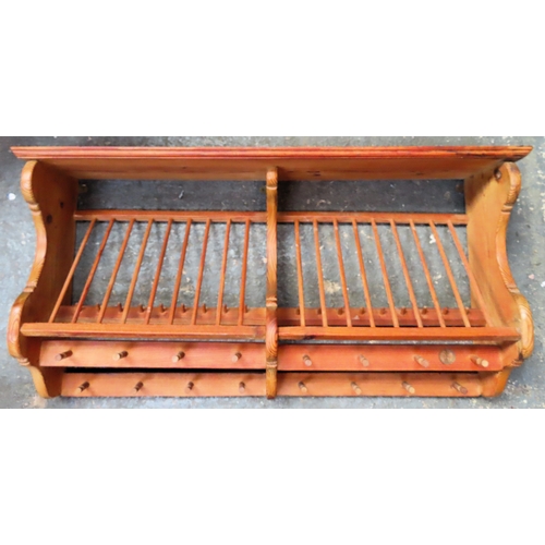 103 - Vintage pine wall mounting 'Penny' wall rack. Approx. 52 x 101 x 22cms