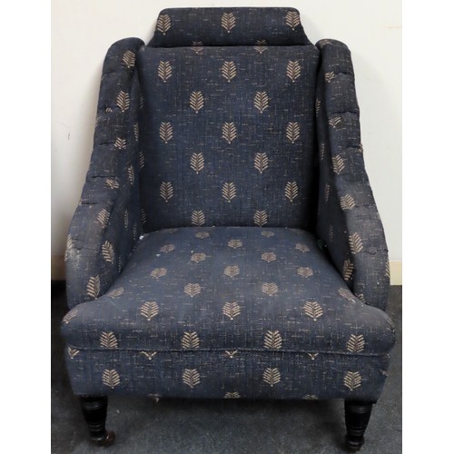 108 - Early 20th century upholstered armchair on ebonised supports. Approx. 92cm H x 73cn W x 78cm D