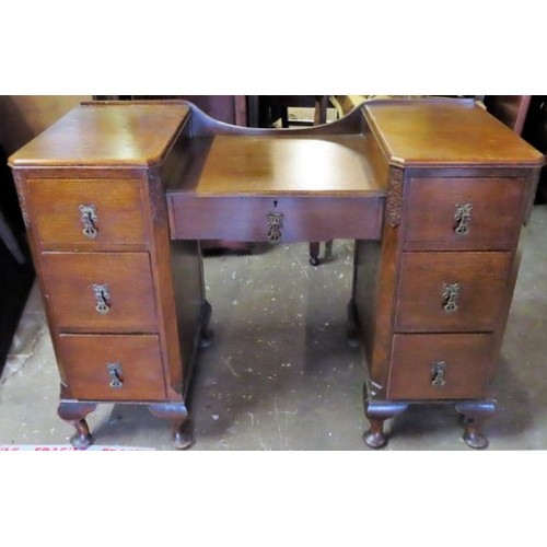 259 - Art Deco oak seven drawer desk. Approx. 79cm H x 107.5cm W x 47cm D