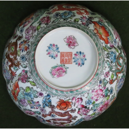 7 - Fine Chinese Eggshell porcelain bowl, decorated with mythical dragons and floral decoration. Approx.... 