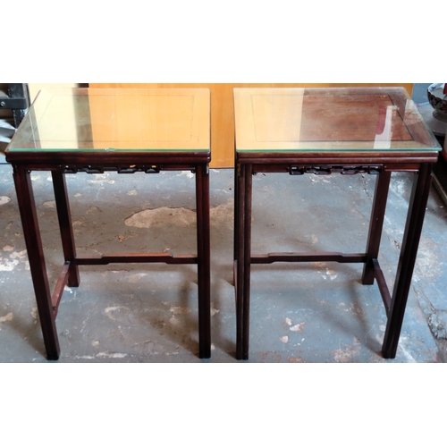 90 - pair of 19th century carved and piercework decorated oriental hardwood side tables. Approx. 64cm H x... 