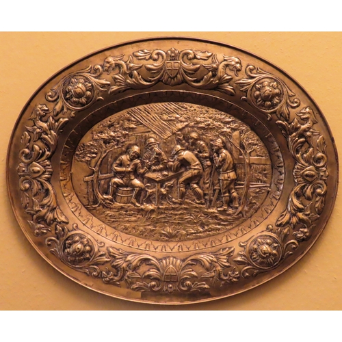 49 - Large repousse decorated brass tray. Approx. 69 x 55cm