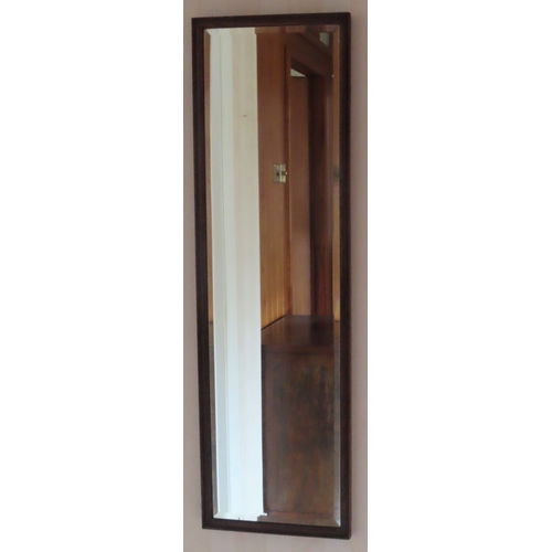 84 - Mid 20th century concave framed bevelled wall mirror. Approx. 110 x 54cms