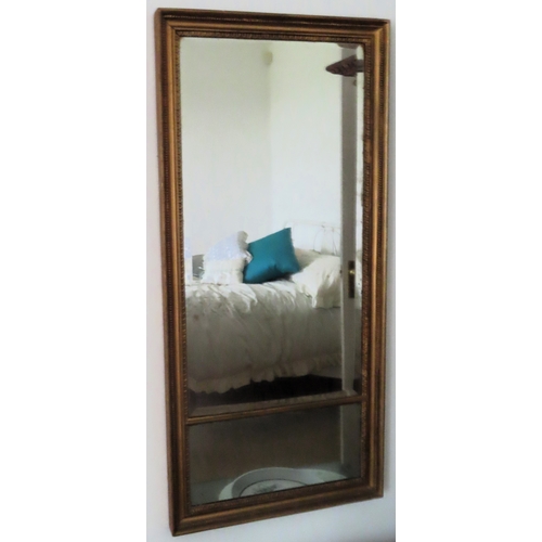 85 - Early 20th century gilded and bevelled sectional wall mirror. Approx. 114 x 54cm