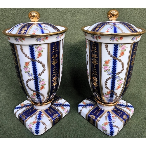 8 - Roselle OCC & Co. Staffordshire pair of gilded and floral decorated ceramic storage jars with cover.... 