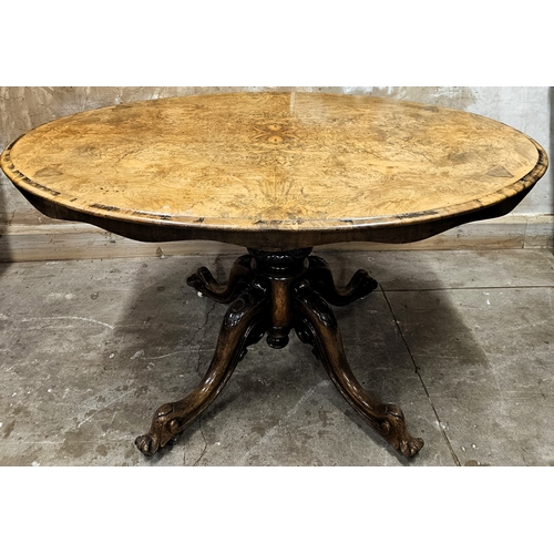 22 - 19th century inlaid walnut veneered oval tilt top looe table on quadrafoil supports. Approx. 71 x 13... 