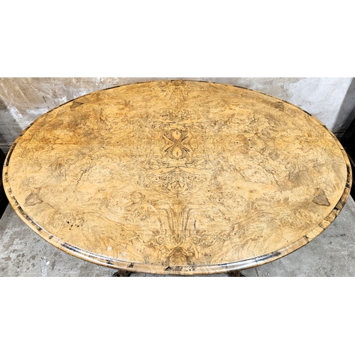 22 - 19th century inlaid walnut veneered oval tilt top looe table on quadrafoil supports. Approx. 71 x 13... 