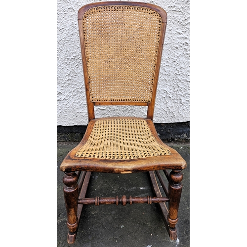 44 - Early 20th century bergere backed/seated rocking chair. Approx. 87cms