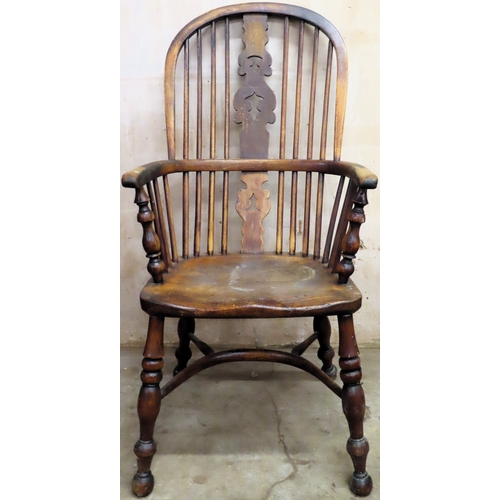 48 - 19th century Ash/Elm Windsor armchair on stretchered supports. Approx. 108cms H