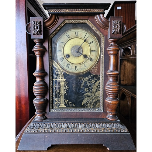 49 - Junghams/Ansonia decorative gilded wooden and glass cased mantle clock. Approx. 39cms H