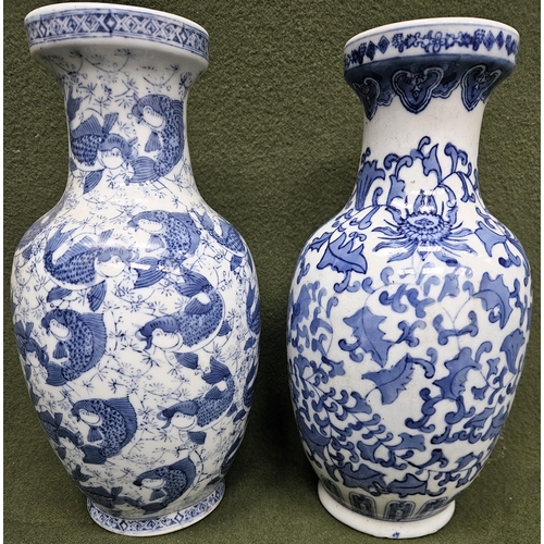 53 - Two Oriental style blue and white ceramic vase. Larger Approx. 31cms