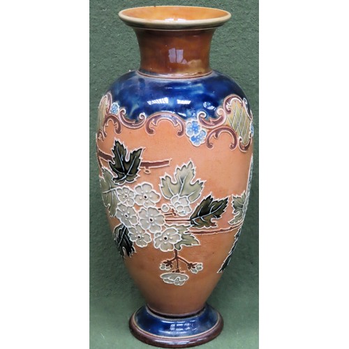 95 - Royal Doulton stoneware glazed vase with tube lined floral decoration. Approx. 31cms H