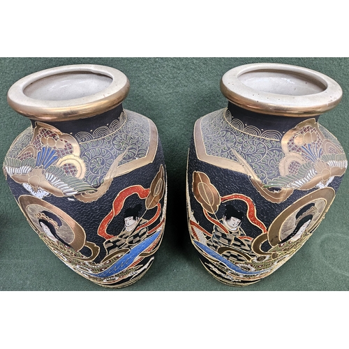 114 - Pair of Japanese hand painted and gilded hexagonal ceramic vases. Approx. 32cms