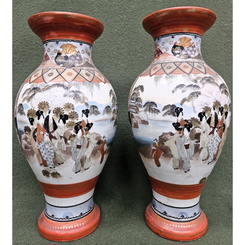 115 - Pair of Oriental ceramic vases with hand painted and gilded decoration depicitng female figures with... 