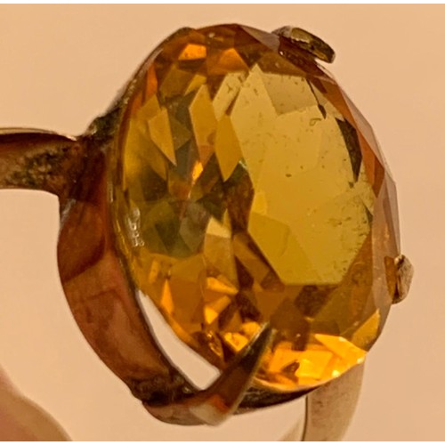 130 - UNMARKED GOLD COLOURED RING MOUNTED WITH APPROX 3ct YELLOW SAPPHIRE COLOURED STONE, TOTAL WEIGHT APP... 