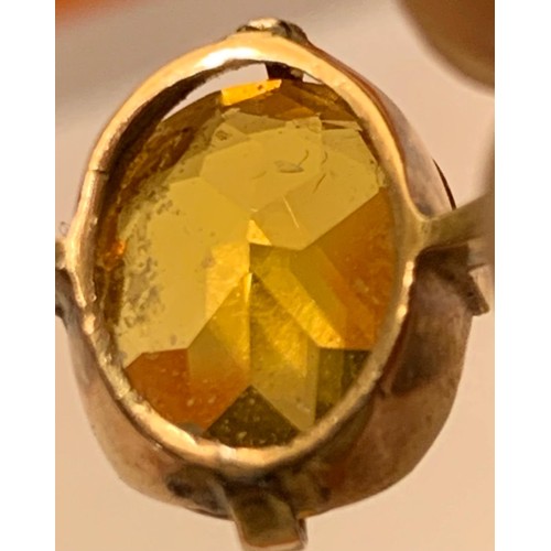 130 - UNMARKED GOLD COLOURED RING MOUNTED WITH APPROX 3ct YELLOW SAPPHIRE COLOURED STONE, TOTAL WEIGHT APP... 