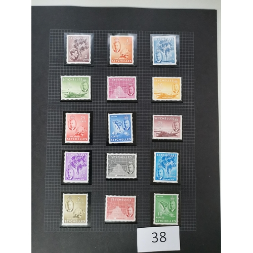 38 - MIXED WORLD.  Mainly KGVI M or UM defins incl. Basutoland to 10/-  Seychelles to 10r etc. (110)