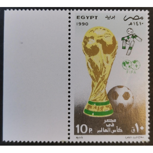 144 - 1990 World Cup 10p with red omitted marginal UM + normal. SG1761 variety. Cat. $250 (Nile Post). (2)