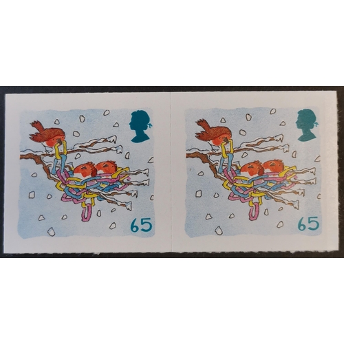 663 - 2001 Christmas 65p pair with die-cut perfs only omitted UM. SG2242ab. (2)