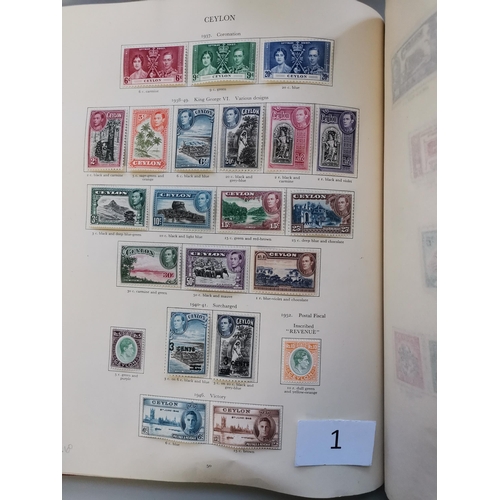 1 - MIXED WORLD.  KGVI Mint collection in very well filled SG album  nearly all in clean condition with ... 