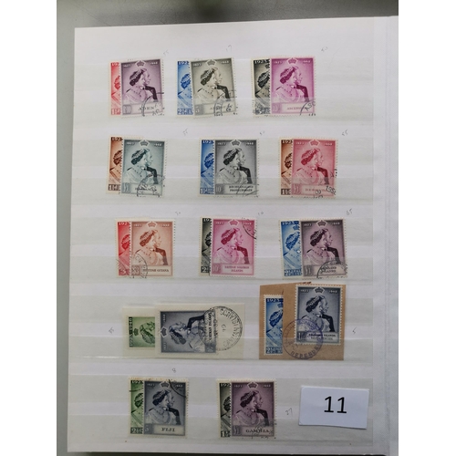 11 - MIXED WORLD.  KGV fine used range of sets and singles in red stockbook  good range of defins  1948 W... 