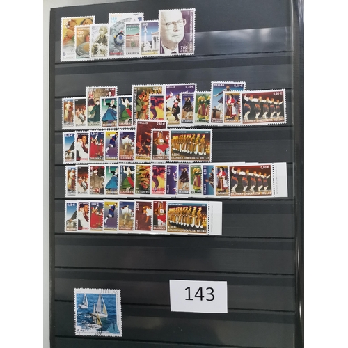 143 - GREECE.  A collection in stockbook with value in c.1980's  1990's UM sets and m/s's with high cat. v... 