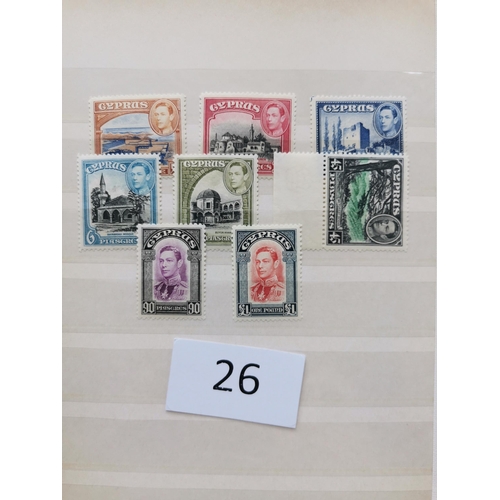 26 - MIXED WORLD. Collections in 2 volumes  one of BC incl. N. Borneo 1939 to $1 M  the other with GB odd... 