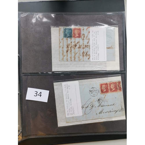 34 - MIXED WORLD. A collection of mainly early period covers and cards in binder  incl. Br. Honduras QV 2... 