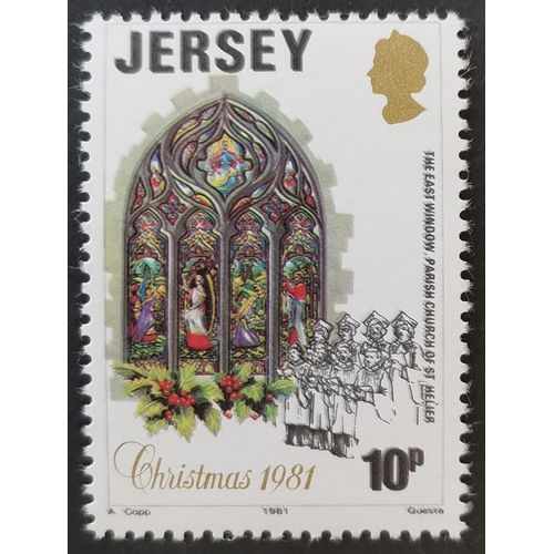 852 - JERSEY. 1981 Christmas 10p with black printing double UM + a normal copy. SG287a. Cat. £150. (2)