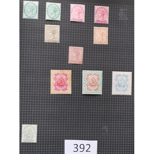 392 - INDIA.  Collection in album incl. 1854 ½a x 7  1d x 5  2a x 2 and 4a cut-to-shape x 2 in mixed condi... 