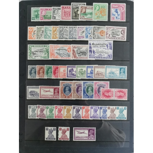 36 - MIXED WORLD.  Collection of KGVI and early QE defins (nearly all complete sets) M on 12 stocksheets ... 