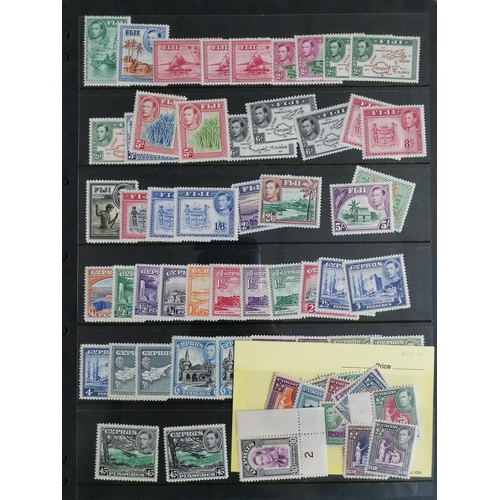 36 - MIXED WORLD.  Collection of KGVI and early QE defins (nearly all complete sets) M on 12 stocksheets ... 