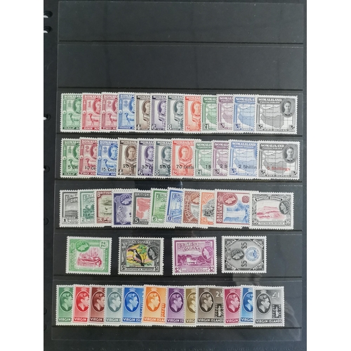 36 - MIXED WORLD.  Collection of KGVI and early QE defins (nearly all complete sets) M on 12 stocksheets ... 