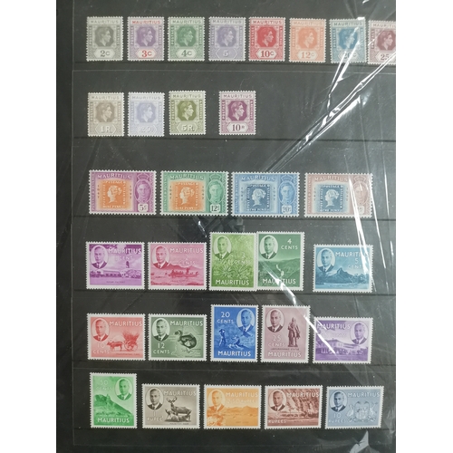 6 - MIXED WORLD.  KGVI mainly M (some used) on leaves  stockcards  many high vals and sets M  with Afric... 