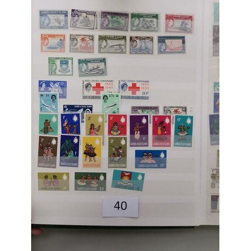 40 - MIXED WORLD.  A collection in 3 stockbooks and envelope  mostly QE with much UM incl. defin sets etc... 