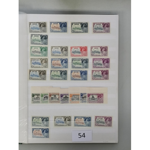 54 - MIXED WORLD.  1935 Silver Jubilee in stockbook with good range of sets  incl. Cyprus  Falk. Is  Gibr... 