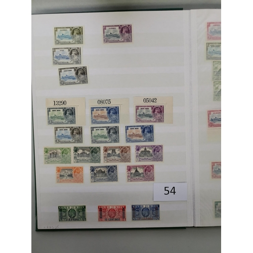 54 - MIXED WORLD.  1935 Silver Jubilee in stockbook with good range of sets  incl. Cyprus  Falk. Is  Gibr... 