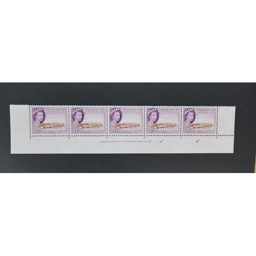 496 - SOMALILAND.  1953- 10/- strip of 5 being the bottom row of the sheet  with imprint  M  mounted in ma... 