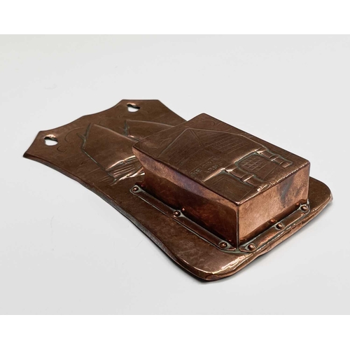 10 - A Herbert Dyer (1898-1974) copper wall mounted matchbox holder, the plaque repousse decorated with a... 