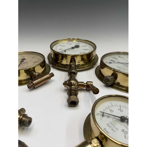 111 - Six assorted maritime brass pressure gauges, including examples by Budenberg, with brass grille and ... 