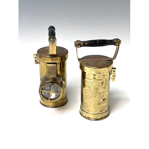 113 - Two brass Ceag inspection lamps, by Ceag Ltd, Barnsley, with ebonised handles, height 23cm.