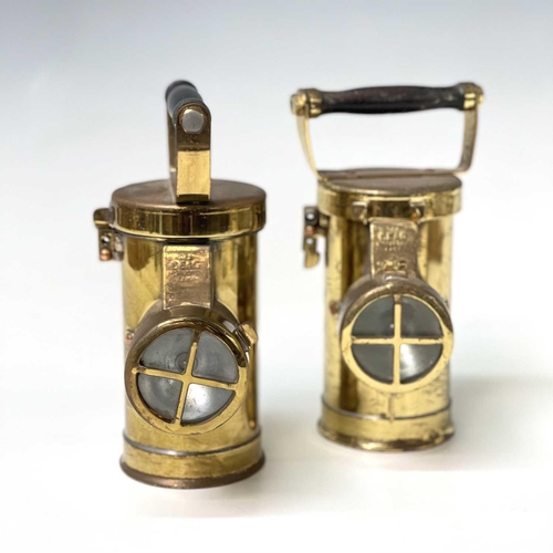 113 - Two brass Ceag inspection lamps, by Ceag Ltd, Barnsley, with ebonised handles, height 23cm.